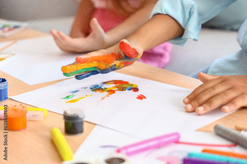 Cute little children drawing at home, closeup