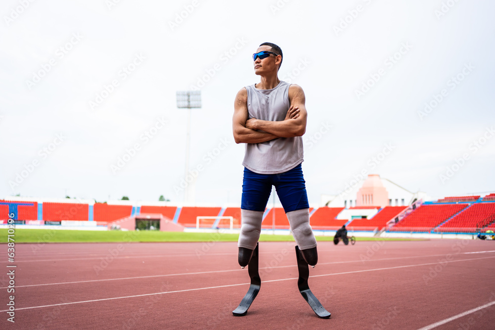 Asian para-athletes disabled with prosthetic blades standing at stadium. 