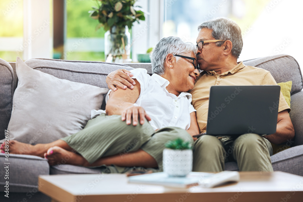 Laptop, love and senior couple on sofa for watching movies, entertainment or streaming in living roo