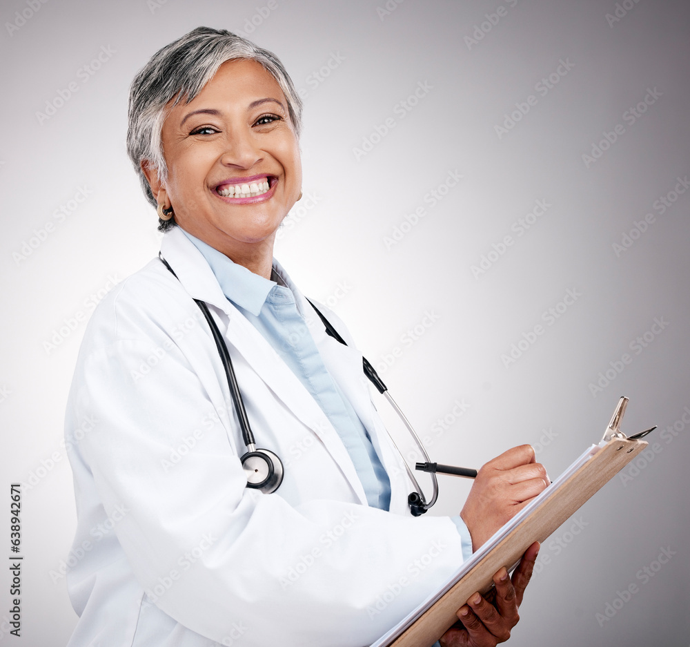 Woman, portrait and doctor writing on clipboard in studio for notes, healthcare administration or in