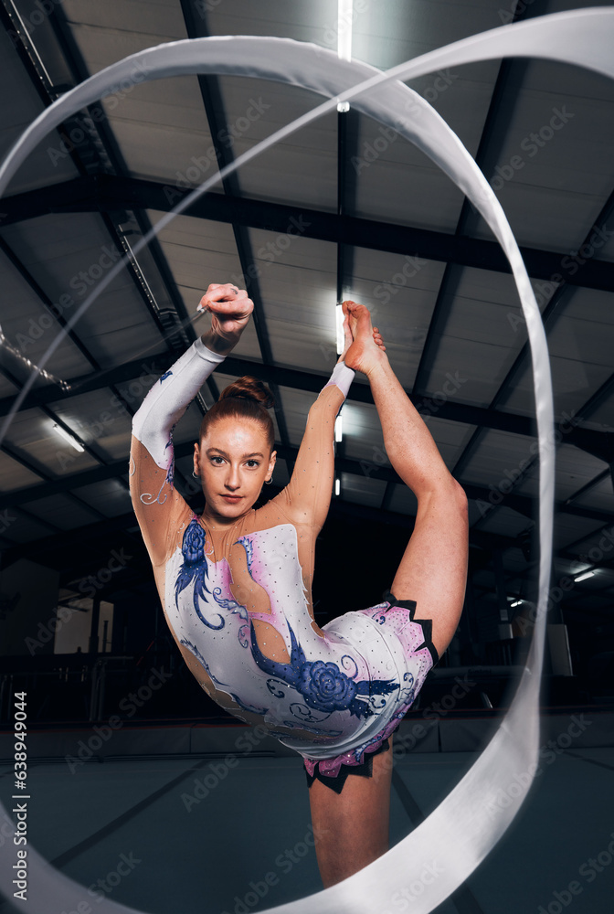 Woman, portrait and balance for ribbon gymnastics in competition, performance or concert in dark are