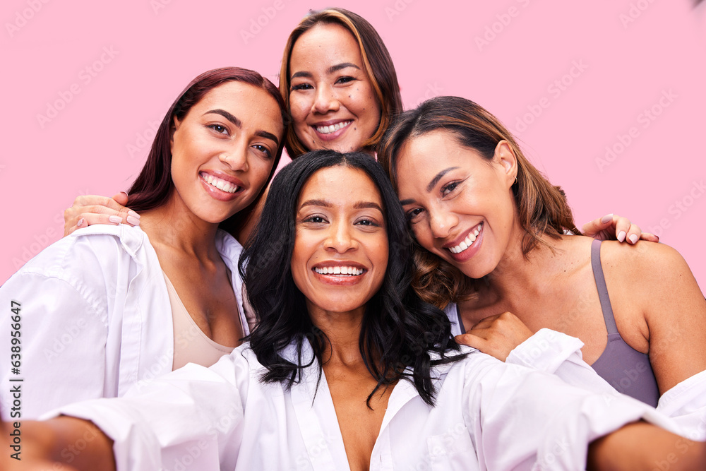 Selfie, beauty and lingerie with woman friends on a pink background in studio for natural skincare. 