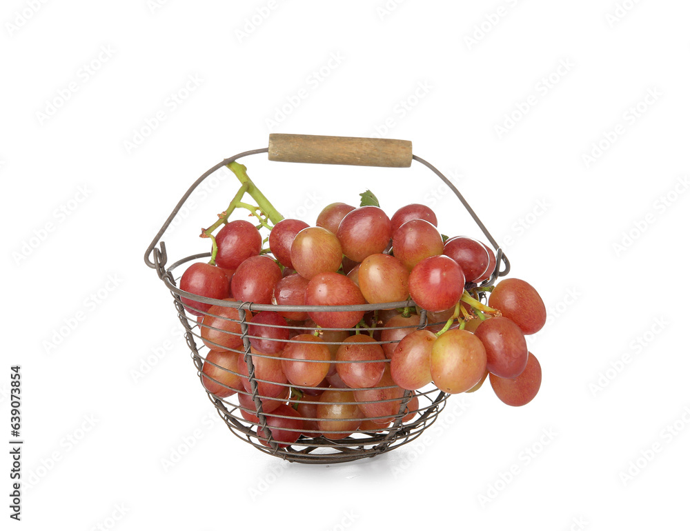 Basket with tasty ripe grapes on white background