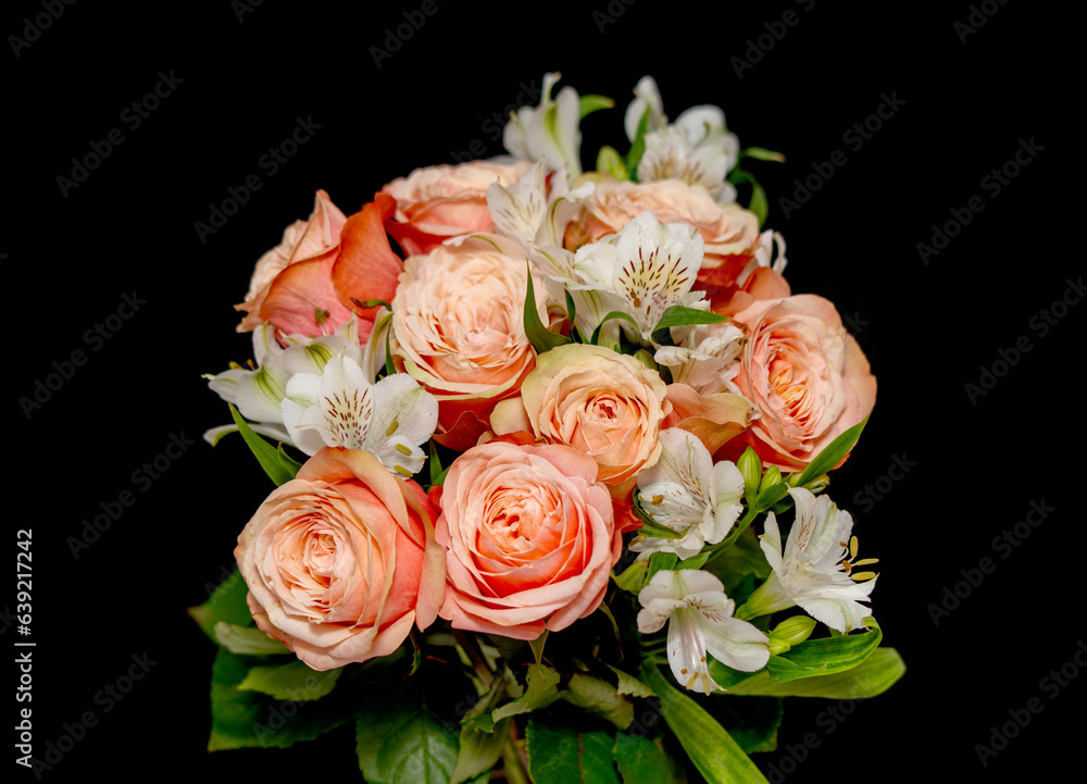 Bouquet of roses on a black background.