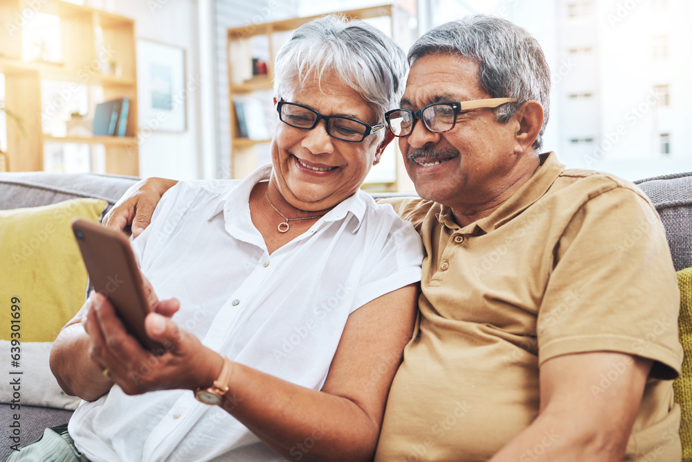 Senior couple, smile and phone on sofa for social media, reading digital news and notification with 