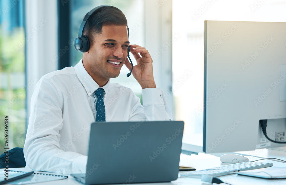 Call center, computer and man in customer service, happy and help desk support in office. Laptop, te