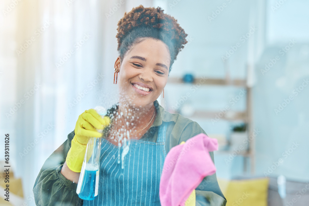 African woman, cleaning window with chemical spray and cloth, smile for hygiene and housekeeping or 