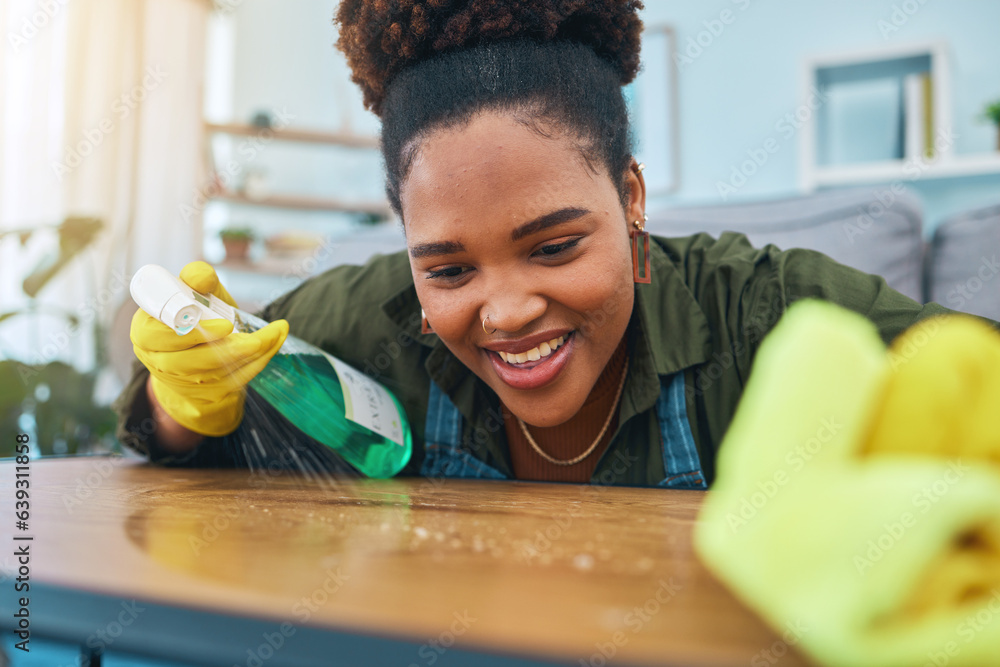 Smile, woman and cleaning table with gloves, spray bottle and soap detergent, housekeeping in home o