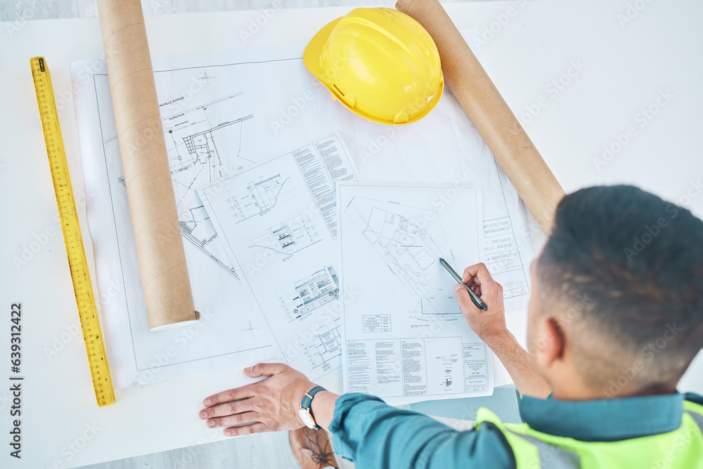 Blueprint, top view architect and planning man, engineer or developer reading floor plan of property