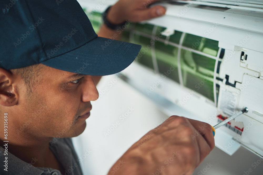 Face, hand and a man for aircon repair or maintenance in an office for circulation or central heatin