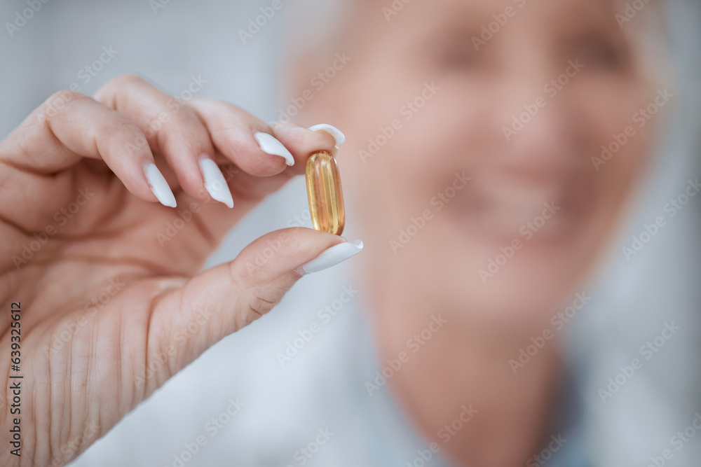 Hand, pill and healthcare with a medicine professional holding a vitamin or supplement closeup in a 