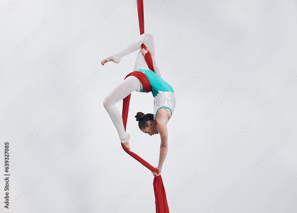 Aerial, woman gymnast fitness and sport performance with girl flexibility and athlete with white bac