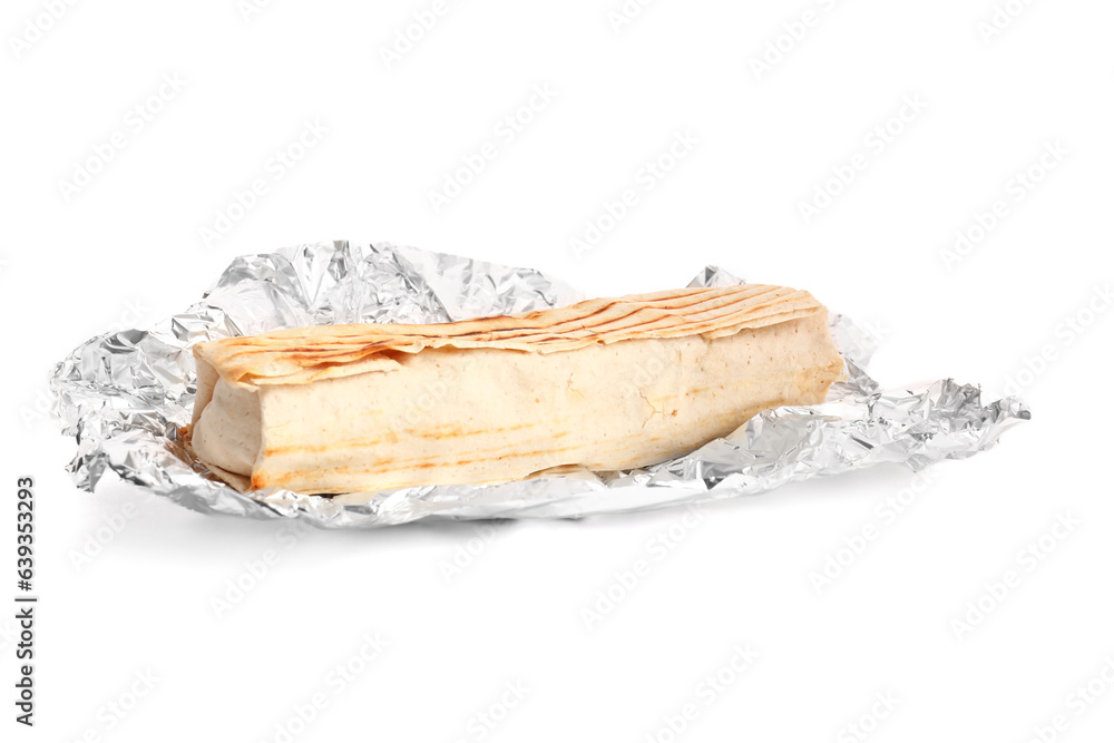 Tasty shawarma with foil on white background