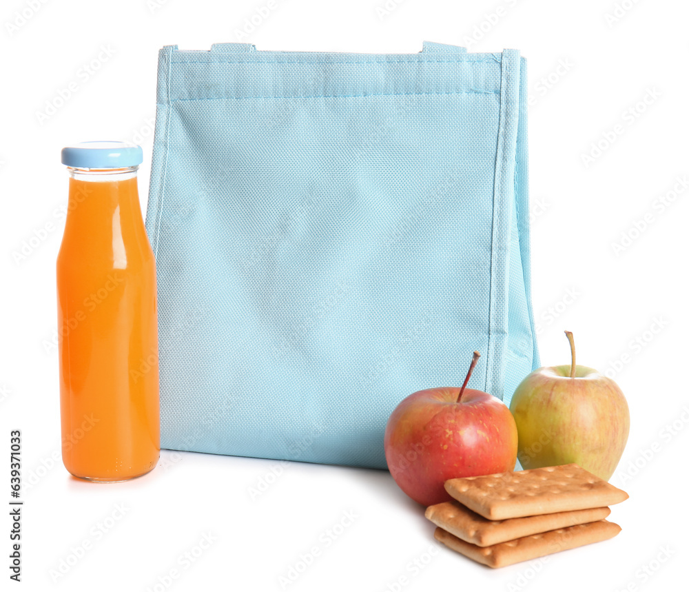 Lunch box bag with apples, crackers and bottle of juice isolated on white background