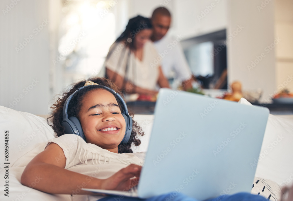 Child, laptop and headphones on sofa for happy video streaming, audio subscription and e learning at