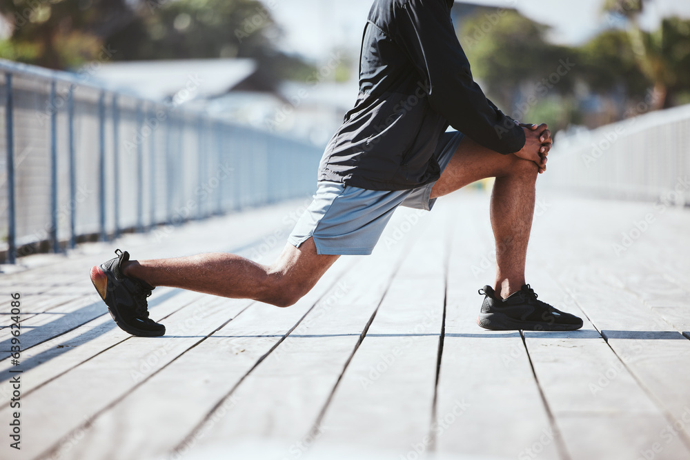 Closeup, city and man stretching, legs and training with warm up, sports and workout with wellness. 