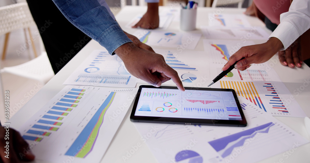 Financial Report Graph Analysis On Tablet