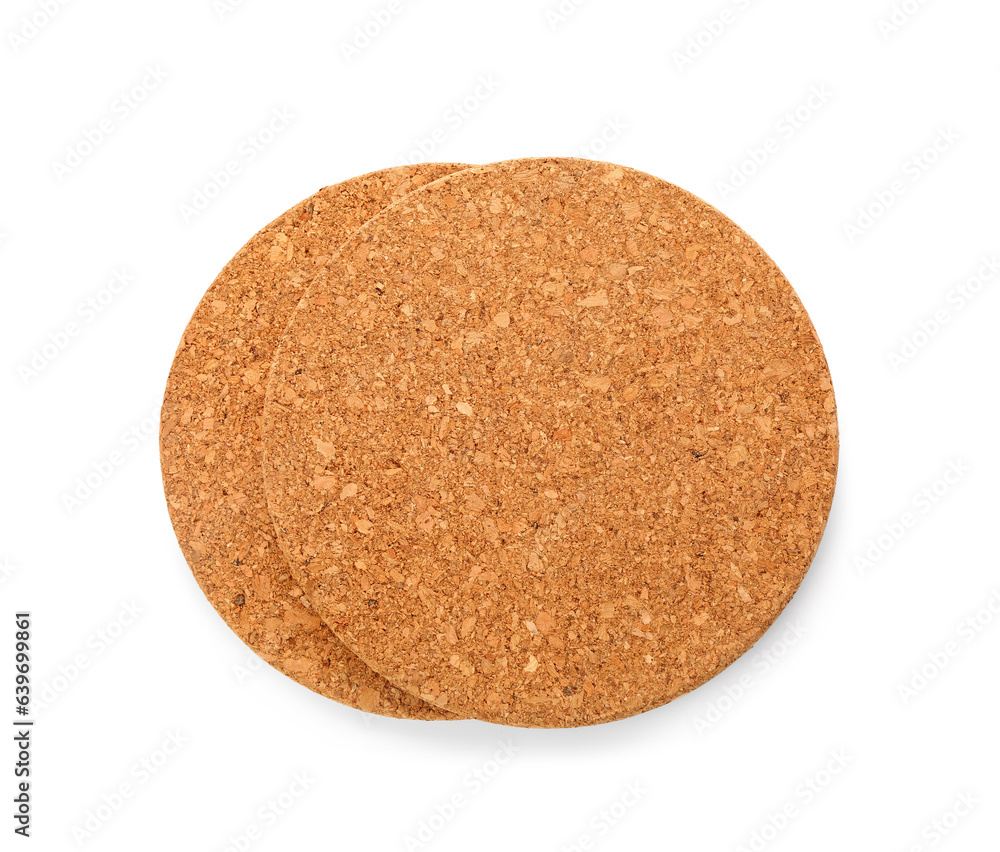 Round cork table coasters on white background