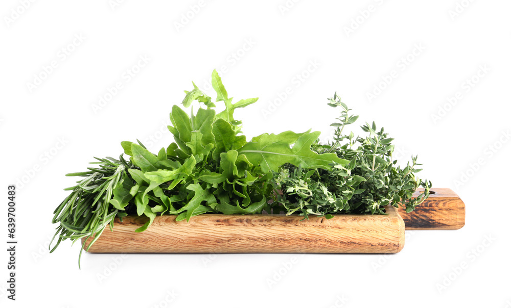 Wooden board with fresh herbs isolated on white background