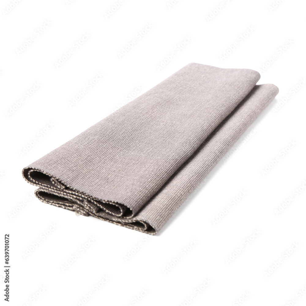 Folded fabric table mats on white background