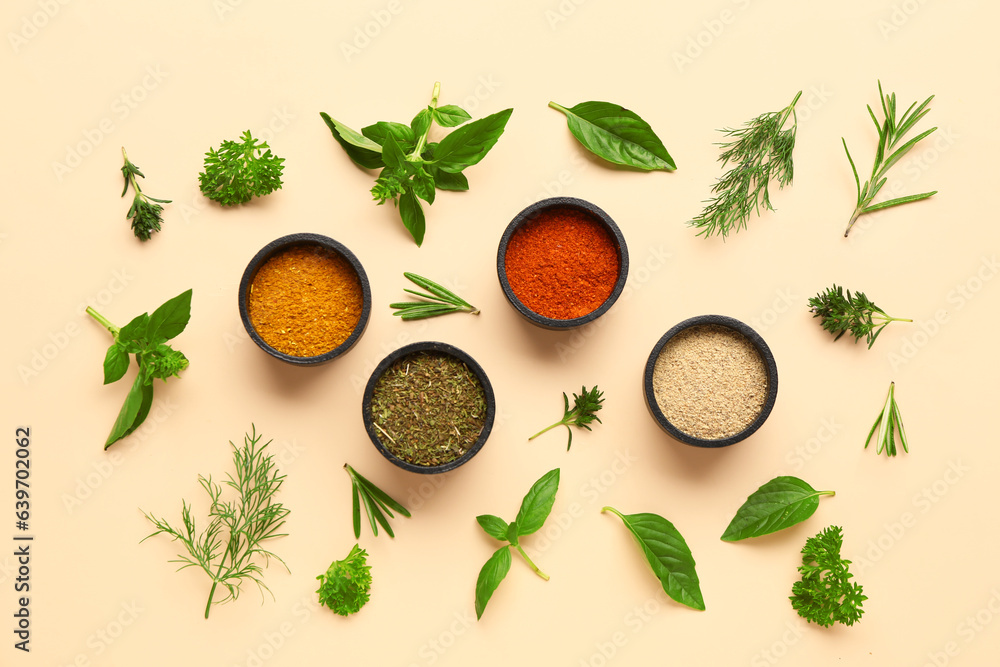 Composition with bowls of spices and herbs on color background