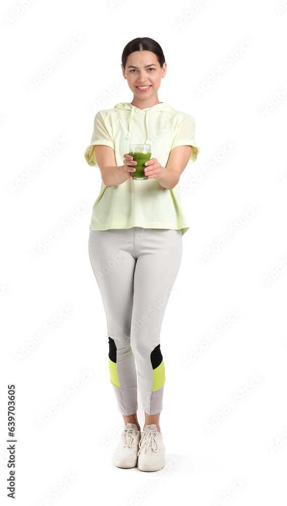 Sporty young woman with healthy smoothie on white background