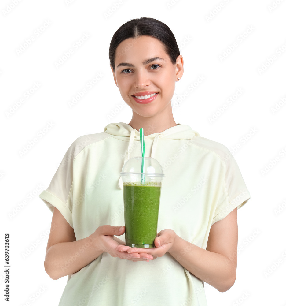 Sporty young woman with healthy smoothie on white background