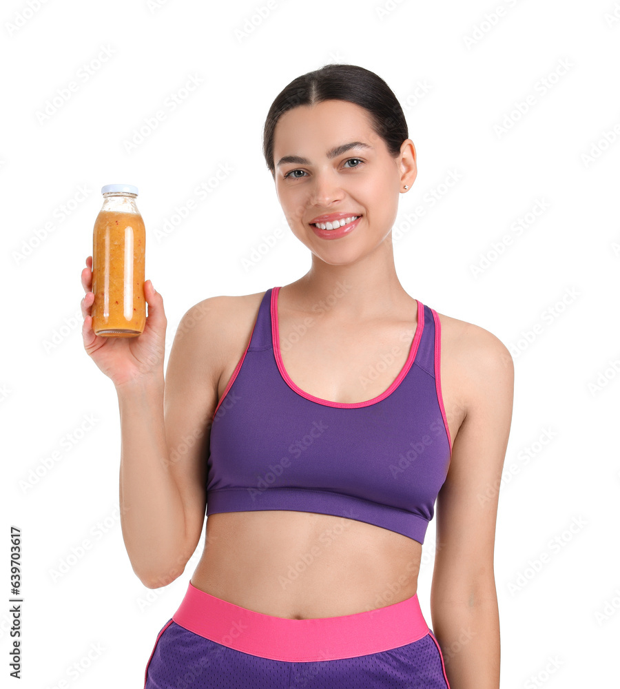 Sporty young woman with healthy smoothie on white background