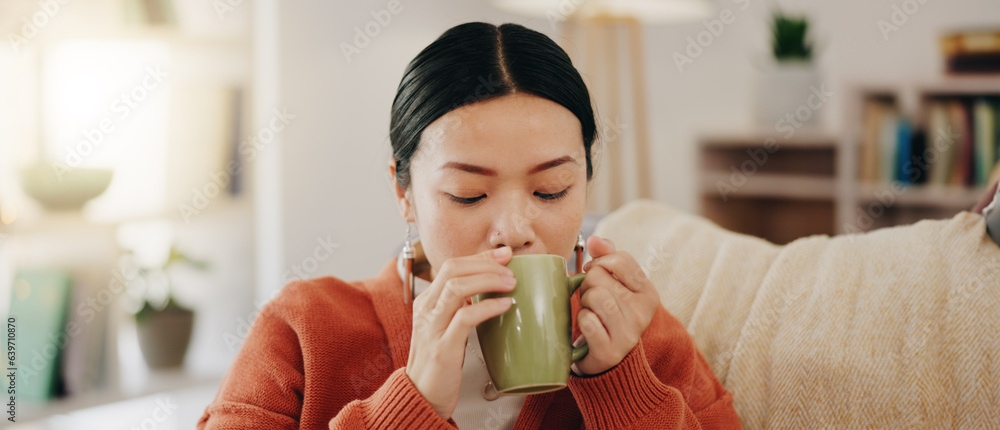 Thinking, coffee and Asian woman on couch, relax and decision with inspiration, decision and calm in