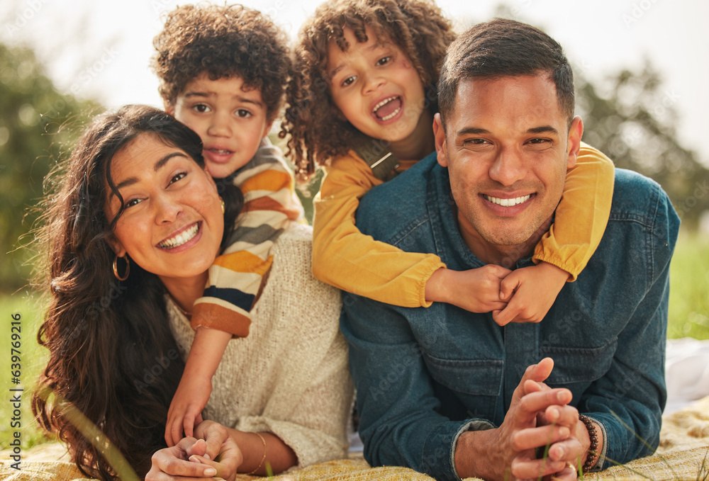 Happy family, parents or couple with kids in a park together and happy for vacation or outdoor vacat