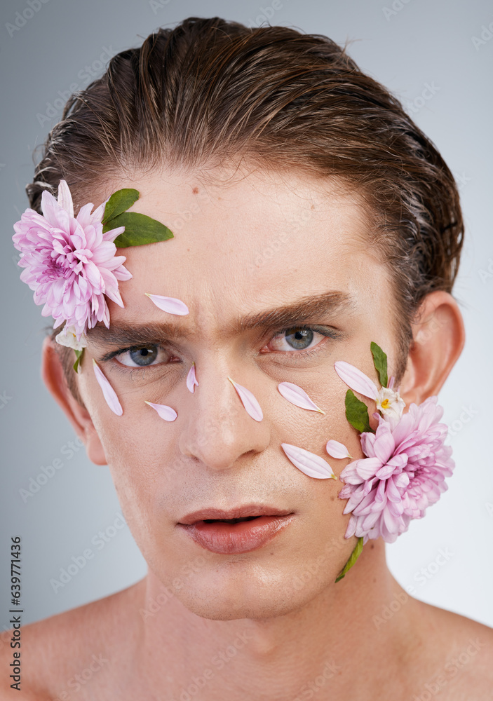 Aesthetic, skincare and flowers with portrait of man in studio for beauty, natural and creative. Hea