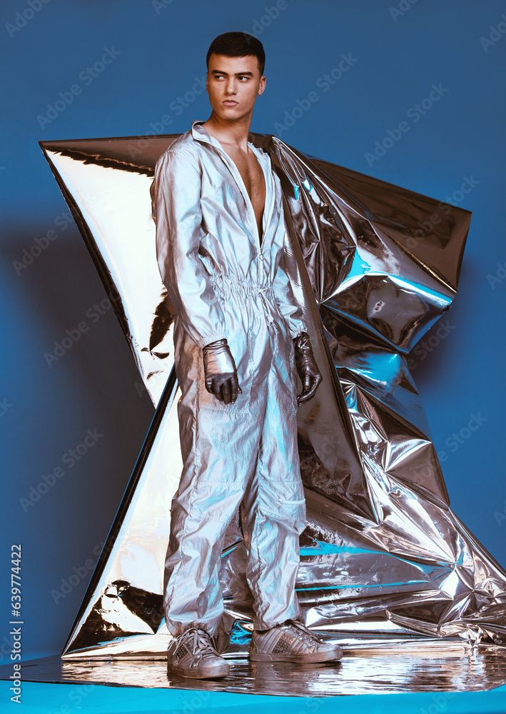 Holographic, vaporwave fashion and man with futuristic ski style with sci fi clothing in studio. Art