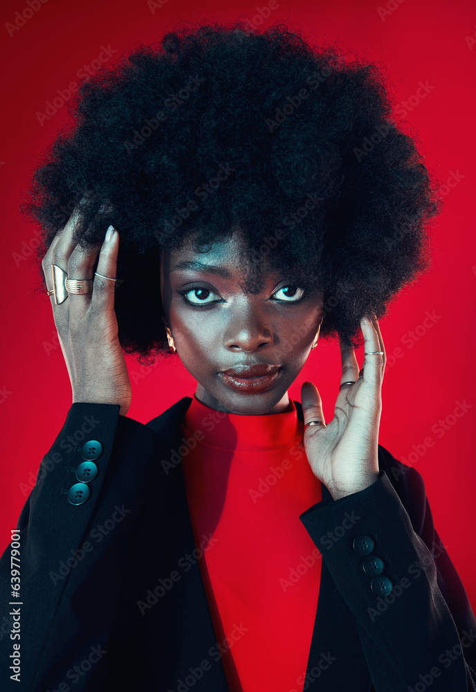 Black woman, makeup and afro, hair and beauty in portrait with shine isolated on red background. Hai