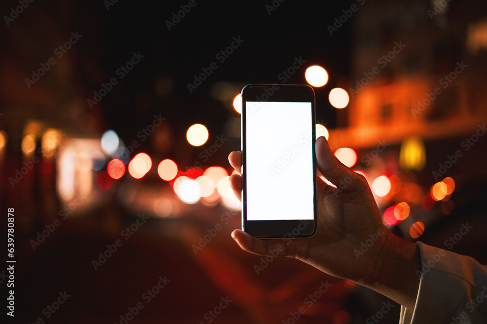 Closeup, mockup and hand with a smartphone, night and social media with digital marketing, chatting 