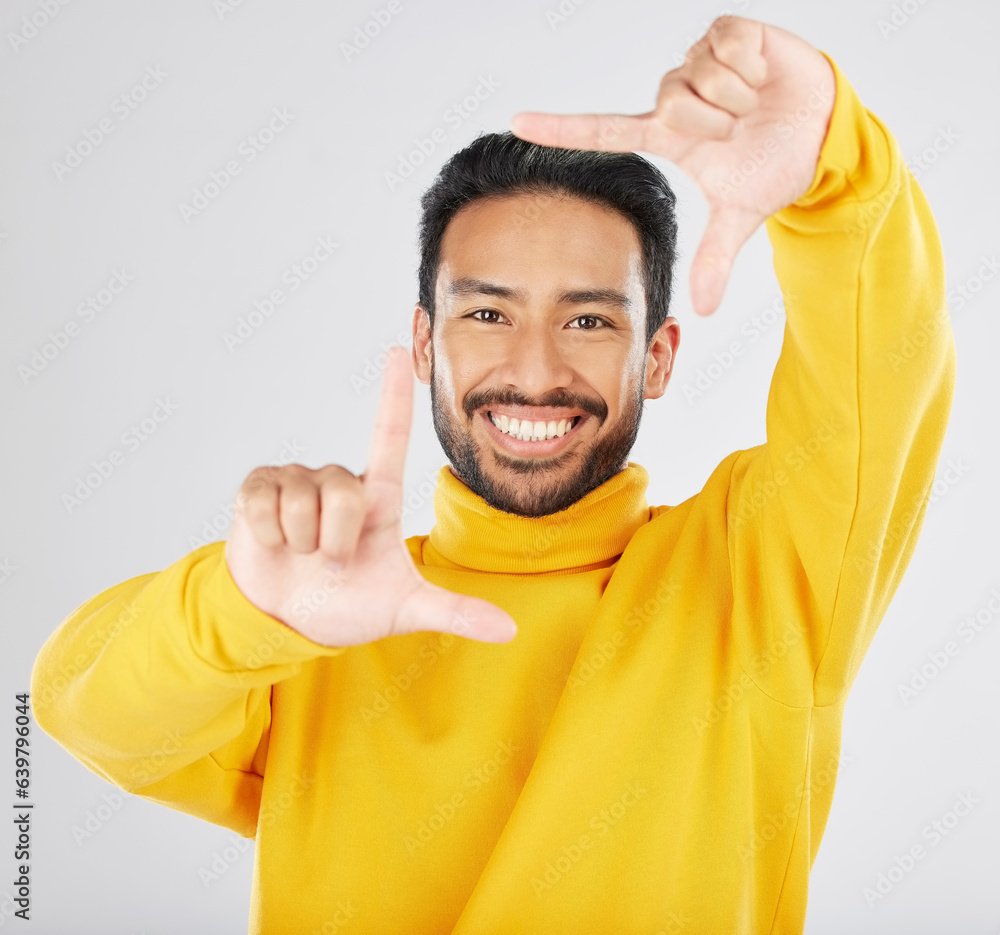 Finger frame, portrait and man in studio to review profile picture, sign and white background. Happy