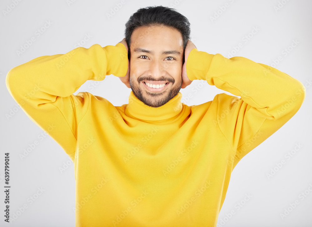 Portrait, smile and man cover ears in studio isolated on a white background. Face, noise and happy A