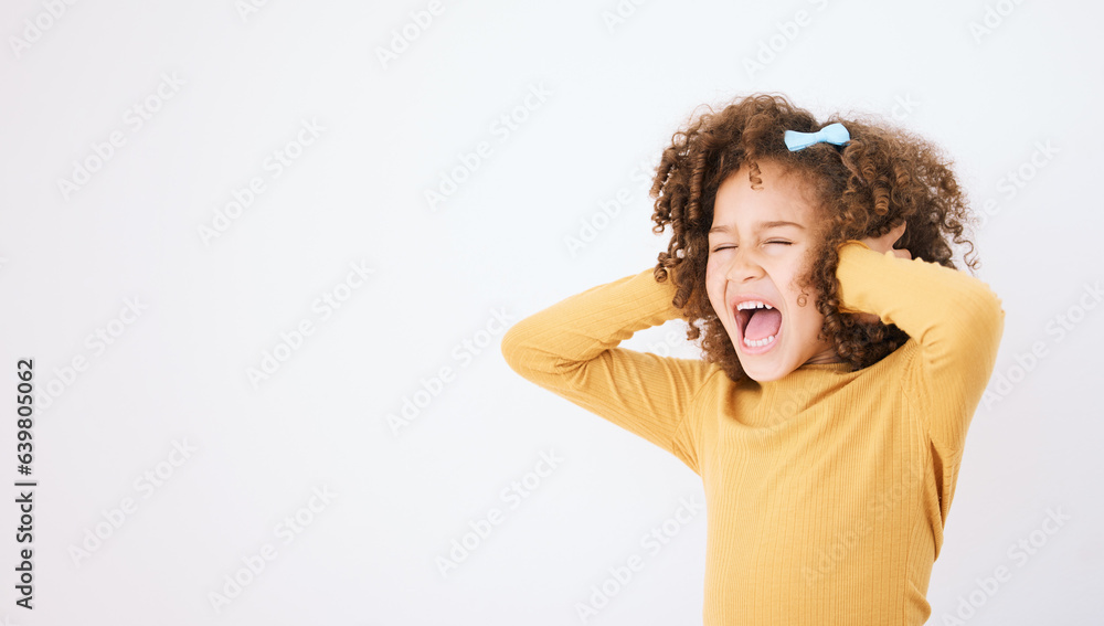 Screaming, loud and mockup with a girl child in studio on a white background covering her ears. Chil