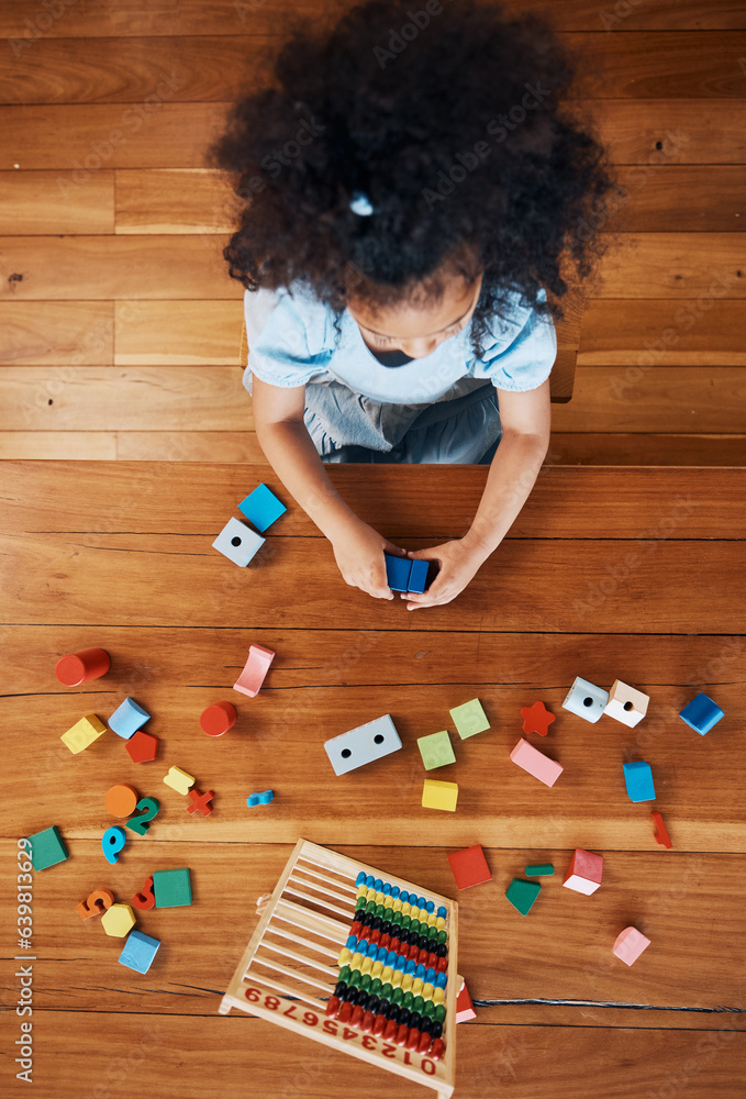 Above, child and toys for learning on the floor, home education and fun activity. House, young and a