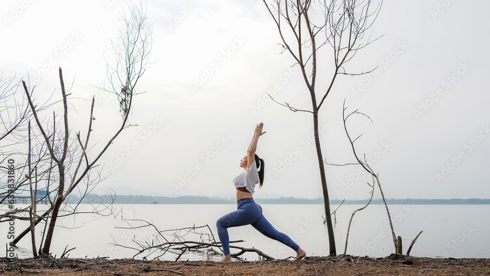 Lifestyle woman worm up raise arm before pose for healthy life. Young people yoga exercise and pose 