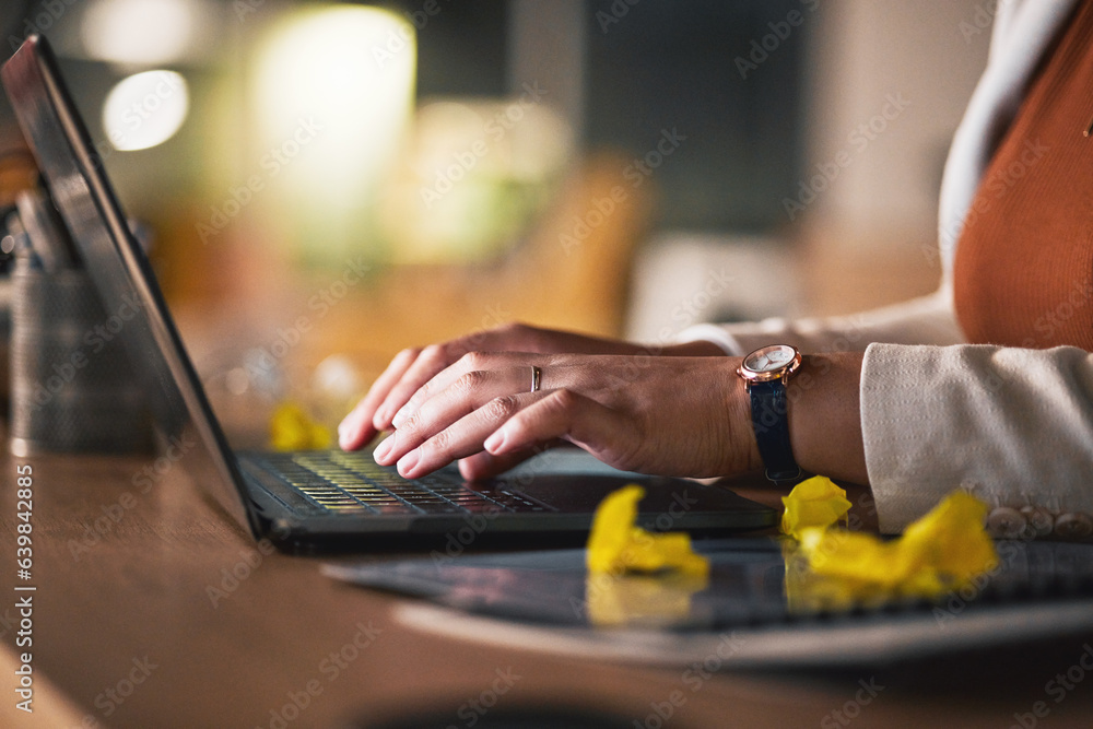 Hands typing, laptop and closeup on table, research and working late on deadline at night. Computer,