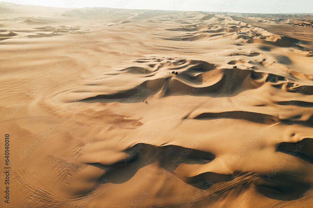 Aerial sunset photo of desert textures in Huacachina, Ica, Peru, South America