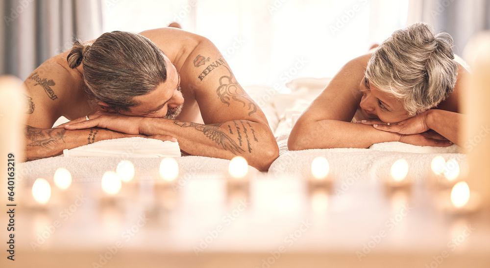 Spa, massage and mature couple on bed for holiday, vacation and anniversary celebration. Love, luxur