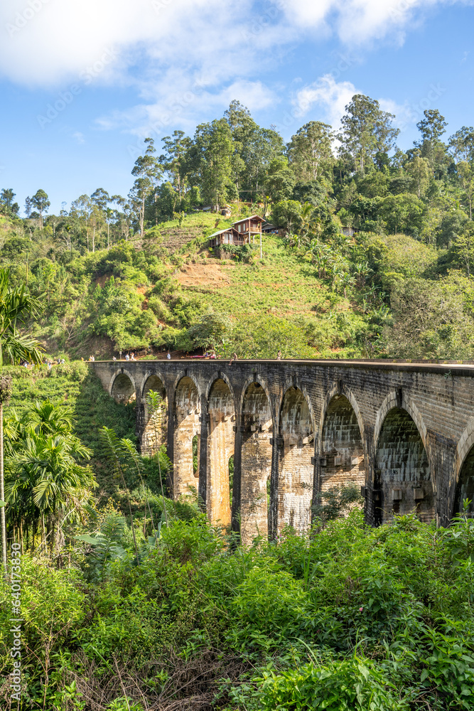 Famous Nine Arch Bridge on a sunny day in Ella, train journey Sri Lanka