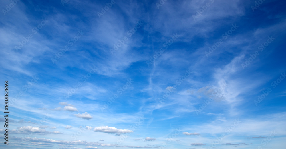 White fluffy clouds in the sky.