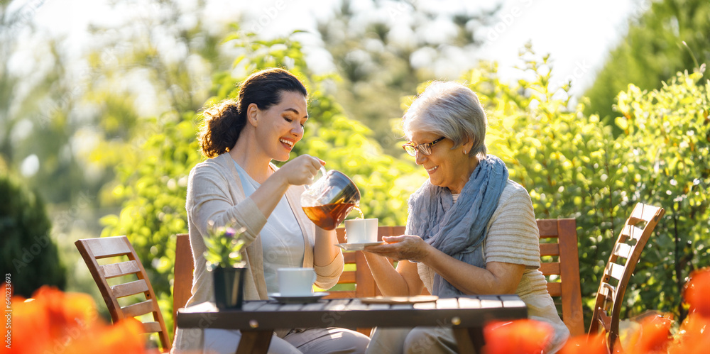 women drinking tea in the garden