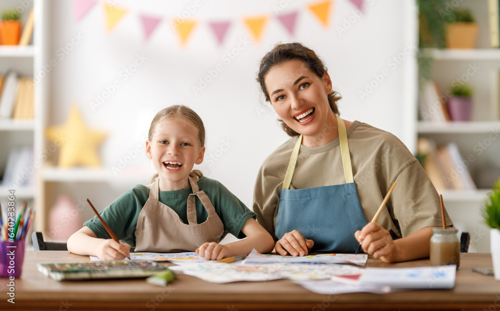 kid and teacher at the art class