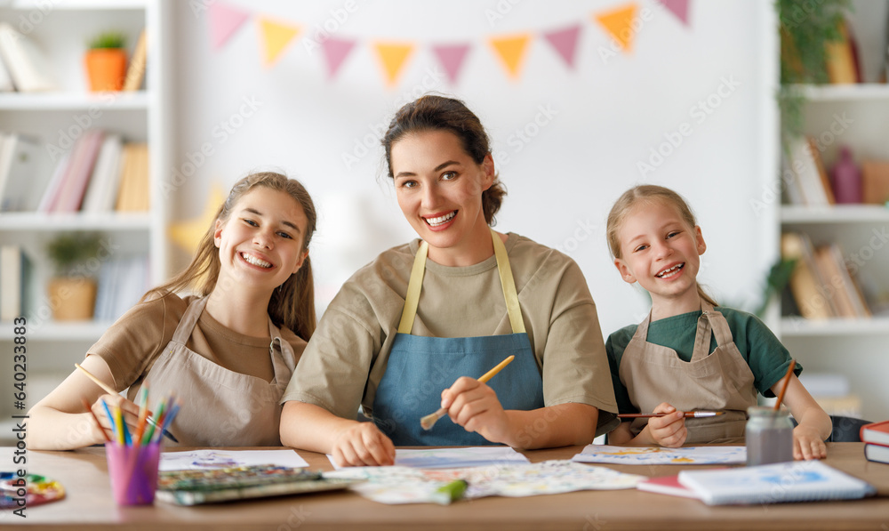 kids and teacher at the art class