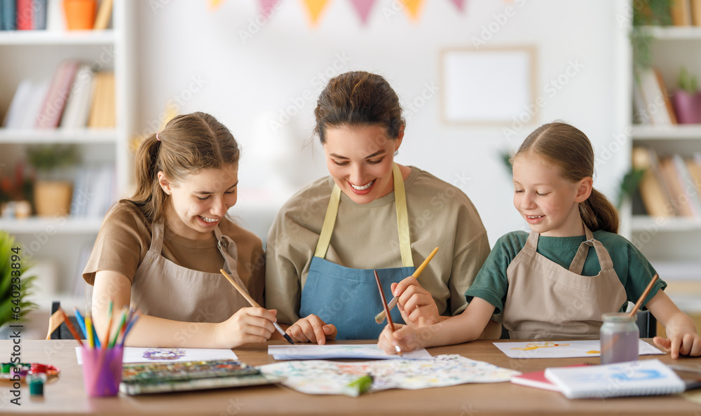 kids and teacher at the art class