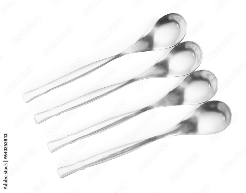 Metal spoons isolated on white background