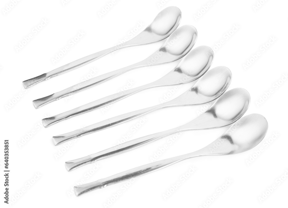 Metal spoons isolated on white background